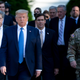 US President Donald Trump walks with US Attorney General William Barr (L), US Secretary of Defense Mark T. Esper (C), Chairman of the Joint Chiefs of Staff Mark A. Milley (R), and others from the White House to visit St. John’s Church after the area was cleared of people protesting the death of George Floyd June 1, 2020, in Washington, DC